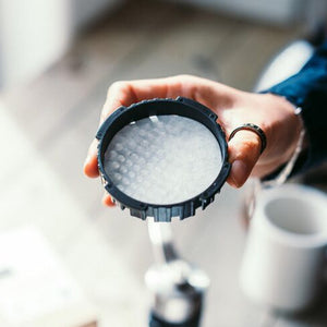 Aeropress filter paper in lid