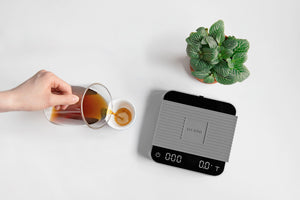 Acaia Pearl 2021 next to coffee cup