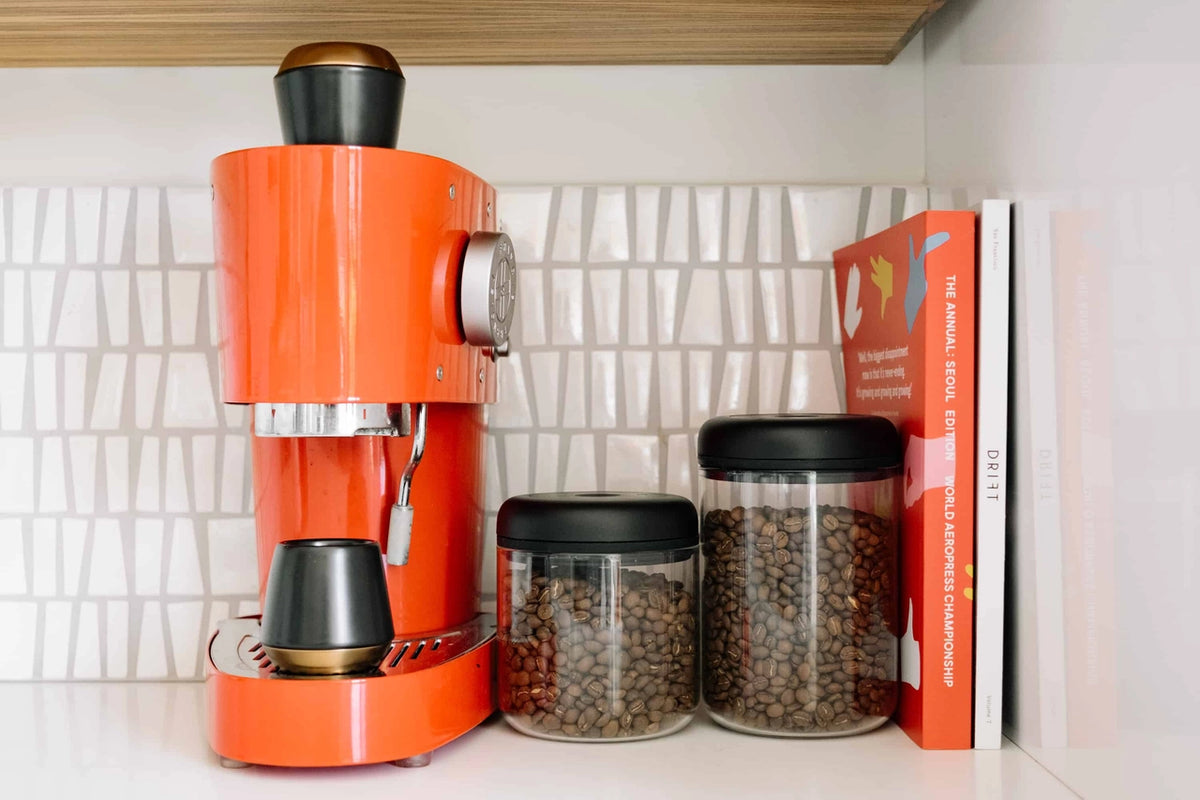 Fellow Atmos glass canisters on a shelf