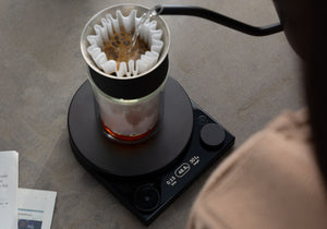 Fellow Tally in use weighing brewed coffee