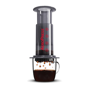 Aeropress coffee maker brewing